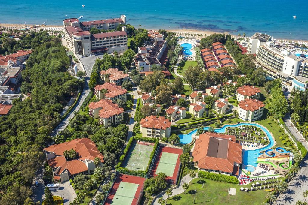 Elevate Your Arrival Experience VIP Transfers from Antalya Airport to Melas Holiday Village in Side for Discerning Travelers Seeking Comfort and Style